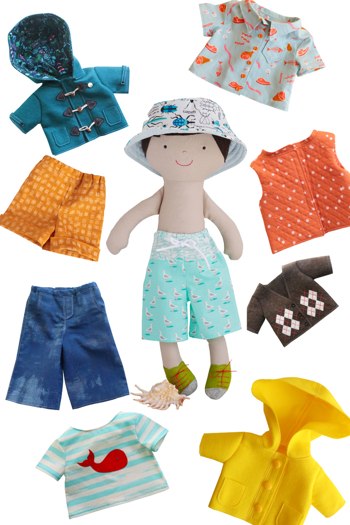 Flat lay of all clothing items included in Henry's sewing pattern: long pants, cuffed shorts, collared shirt, T-shirts with motifs, cardigan, quilted vest, duffle coat, boardshorts, and reversible hat.