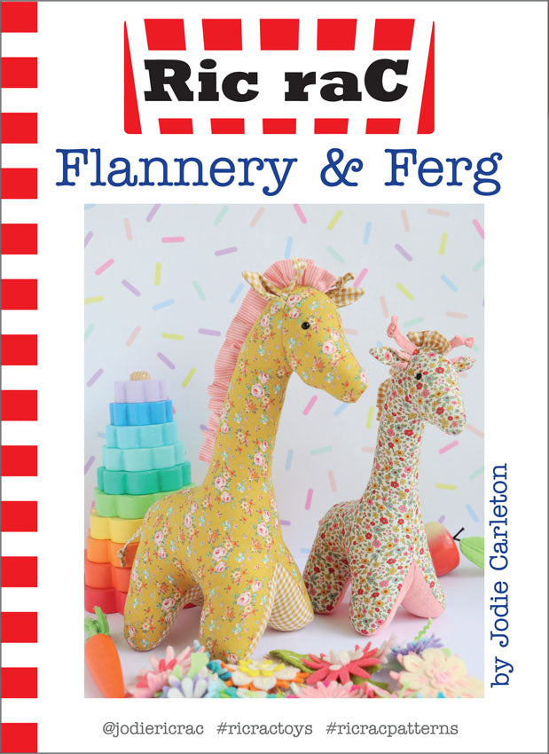 pattern cover of 'Ric rac Flannery & Ferg' with two stuffed giraffes and colorful blocks on a white background.