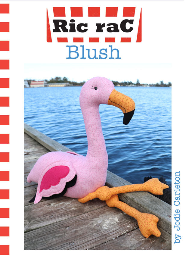 Blush the Flamingo Sewing Pattern | PDF Soft Toy Pattern featuring a pink flamingo on the dock by the water.