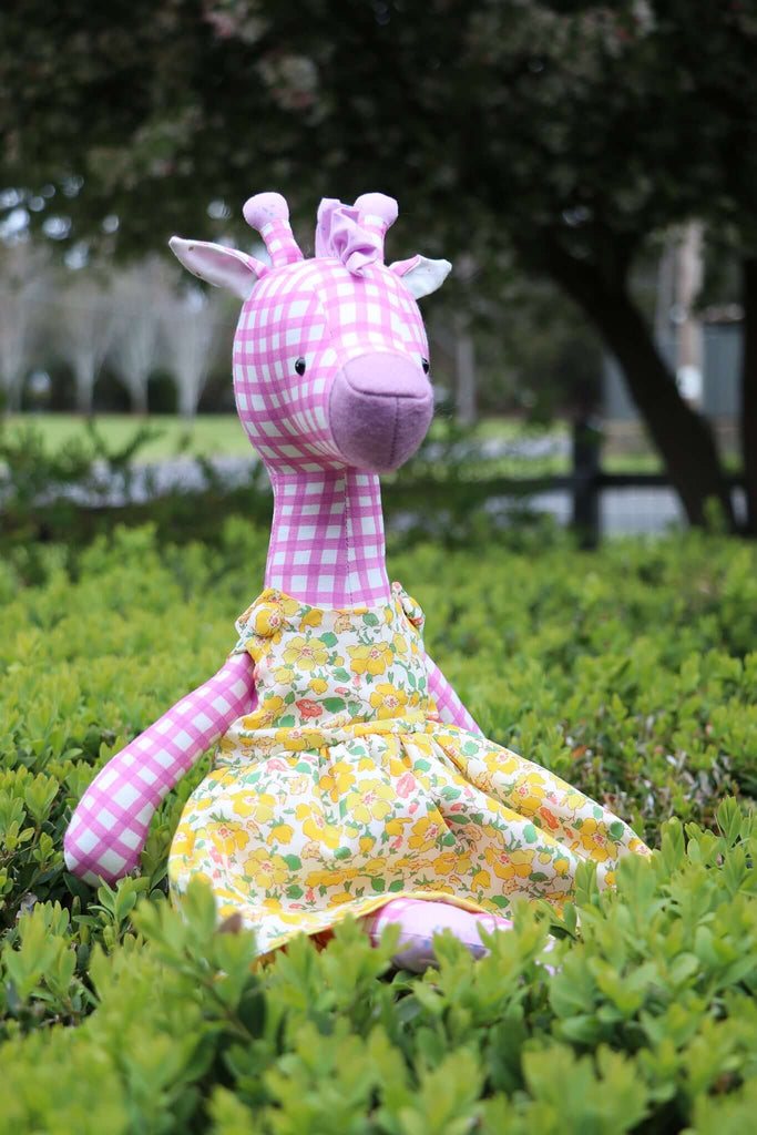 Giraffe soft toy in floral yellow dress made from sewing pattern PDF